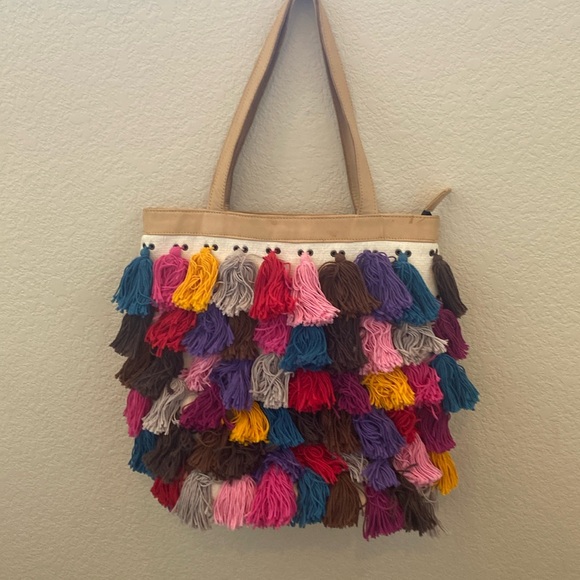 Noonday Collection Handbags - Noonday Collection La Gloria Tote Bag. Multi colored tassels. Full zip.